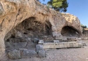 The ruins of the Temple of Pluto, the lord of the underworld in Eleusis. In this small temple pilgrims mimicked Persephone and were symbolically taken to the underworld. At some point the initiates were given a drink containing alcohol, opium, and a substance that was akin to LSD. Small wonder people were later unable to describe what they experienced. Photo by John Buckner