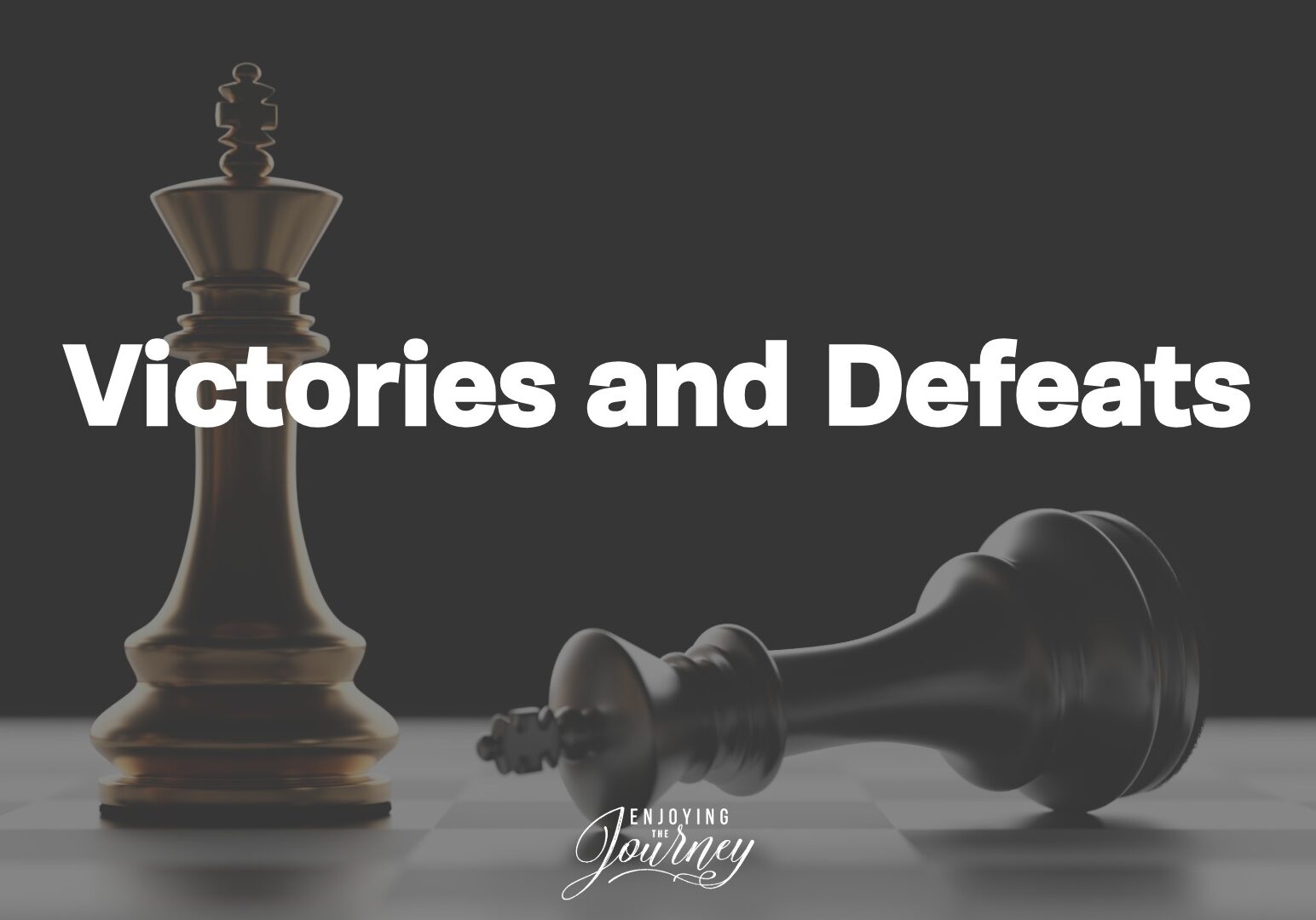 Two king chess pieces, one standing and one falling