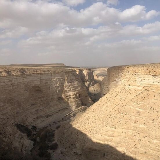 The word for wilderness is “meedbar,” (מדבר). This word is spelled exactly the same in the Hebrew text as “he speaks, or I speak.” He speaks/I speak is written the same (מדבר) but pronounced differently “meh-dah-ber.” Ancient readers of the Hebrew Bible saw these words and linked them in their minds. Therefore, the wilderness must be the place where He speaks to you. The spectacular cliffs of Sede Boger in the south of Israel near Beersheba. It has been identified by some scholars with the Wilderness of Zin, which is mentioned in several places in Numbers and Deuteronomy. It is a popular destination for modern hikers and climbers. Photo by John Buckner